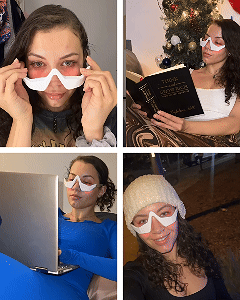 Ženska uporablja EyeLux Pro sproščeno na kavču