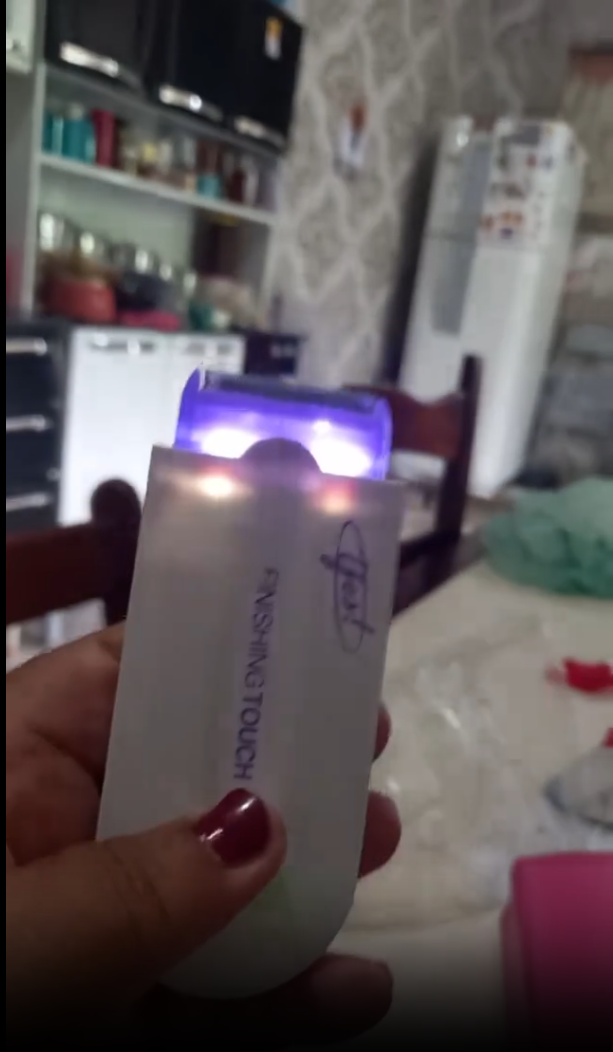 Finishing Touch na mão da cliente